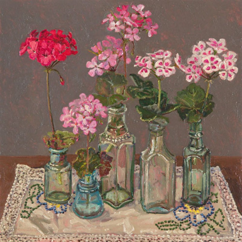 Geraniums in bottles