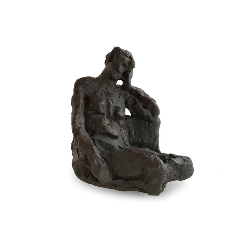 Seated figure [repose to the left]